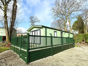 a close up of a green fence